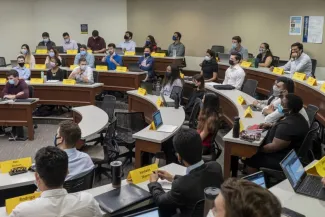 Students during a class at Gleason Hall of the Simon Business School at the University of Rochester in Rochester, New York on Sept. 14, 2021. Libby March/Bloomberg